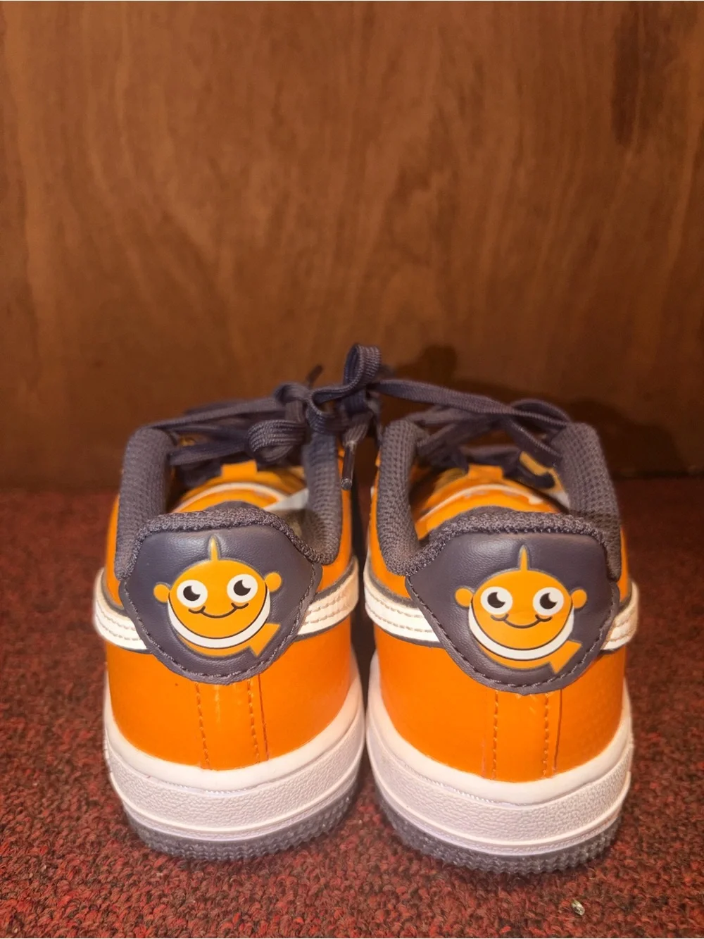 Nike Kids Orange and Gray Low-Top Sneakers with Smiley Heel